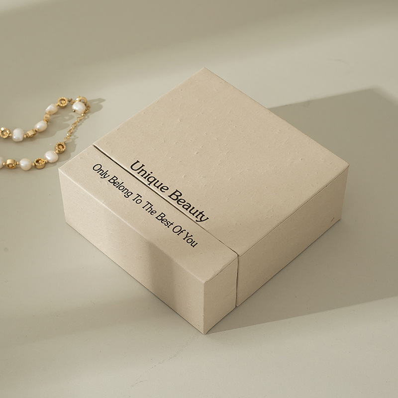 Boîte de papier en carton d'emballage cadeau de bague de mariage de fiançailles de bijoux de luxe rose personnalisé